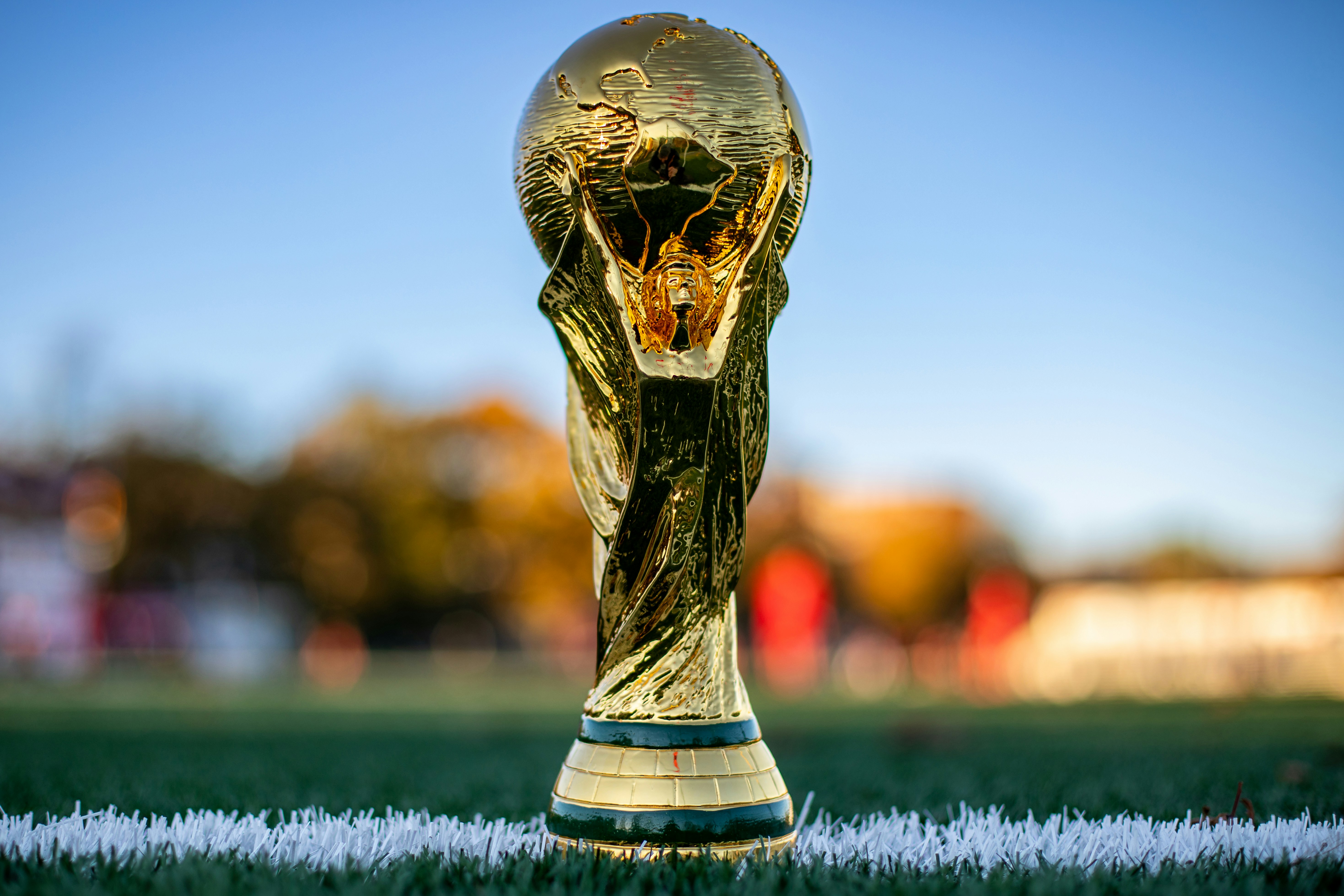 World Cup trophy on a football pitch
