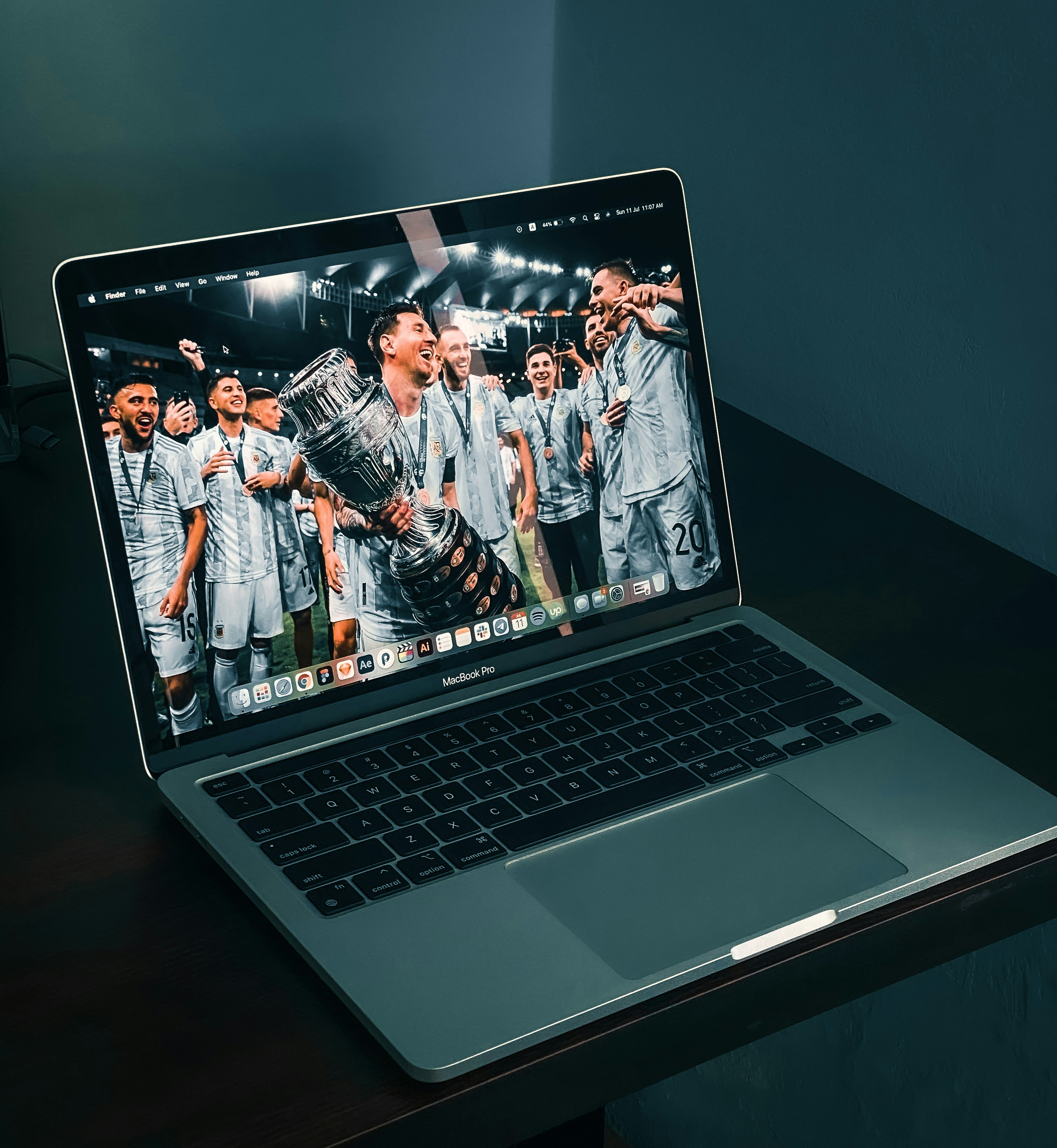 Laptop showing a football celebration